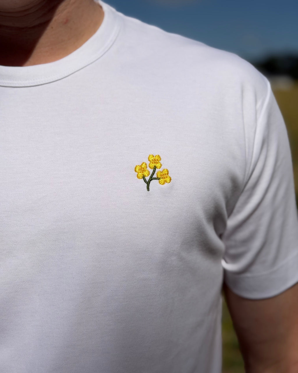 T-Shirt mit Rapsblüte